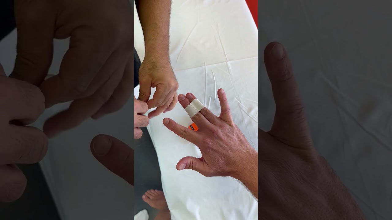 Unieruchomienie dw&oacute;ch palc&oacute;w przy użyciu Spophy Athletic Tape