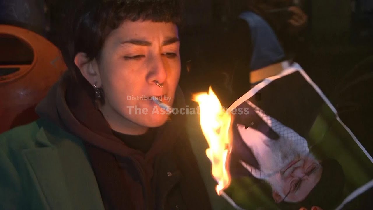Exiled Iranians in Germany show anger and tears over government crackdown on protesters