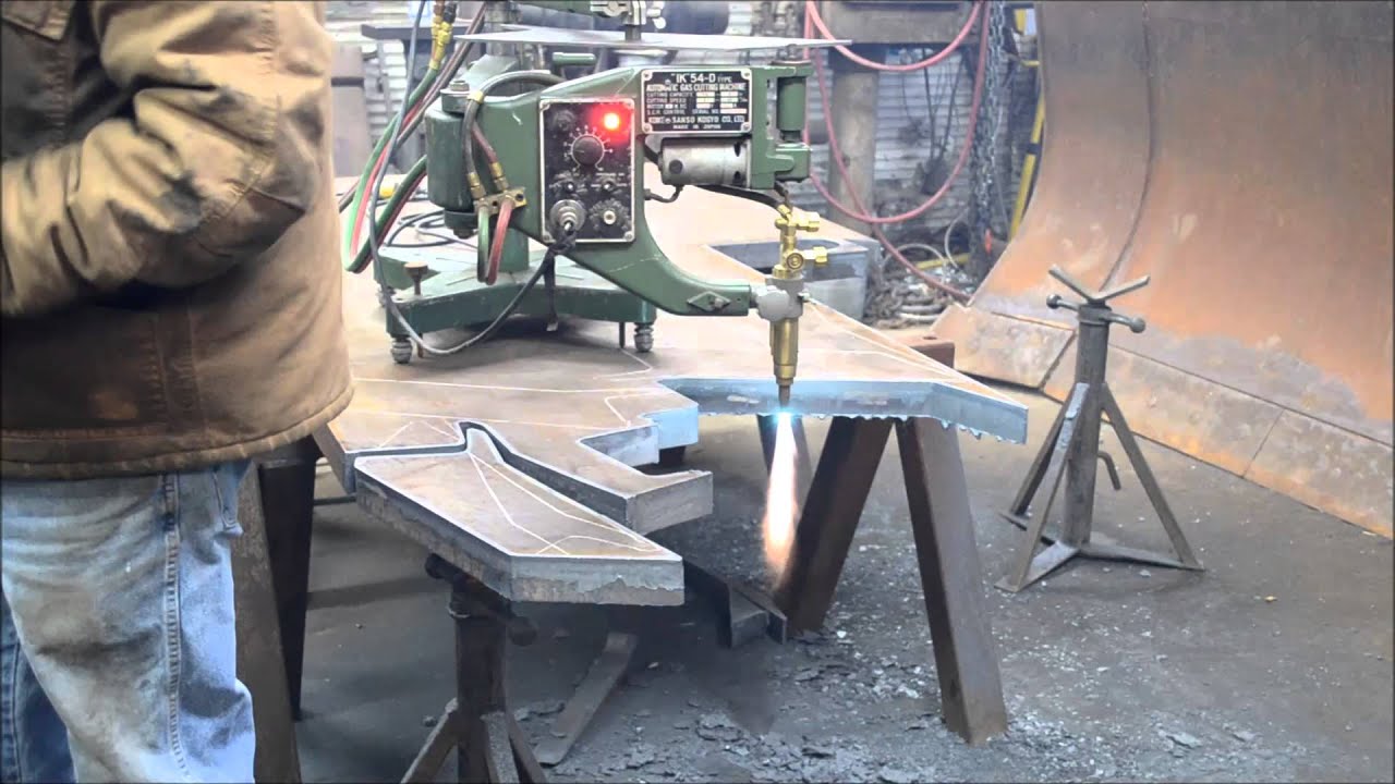 Cutting a tooth for the dozer brush rake