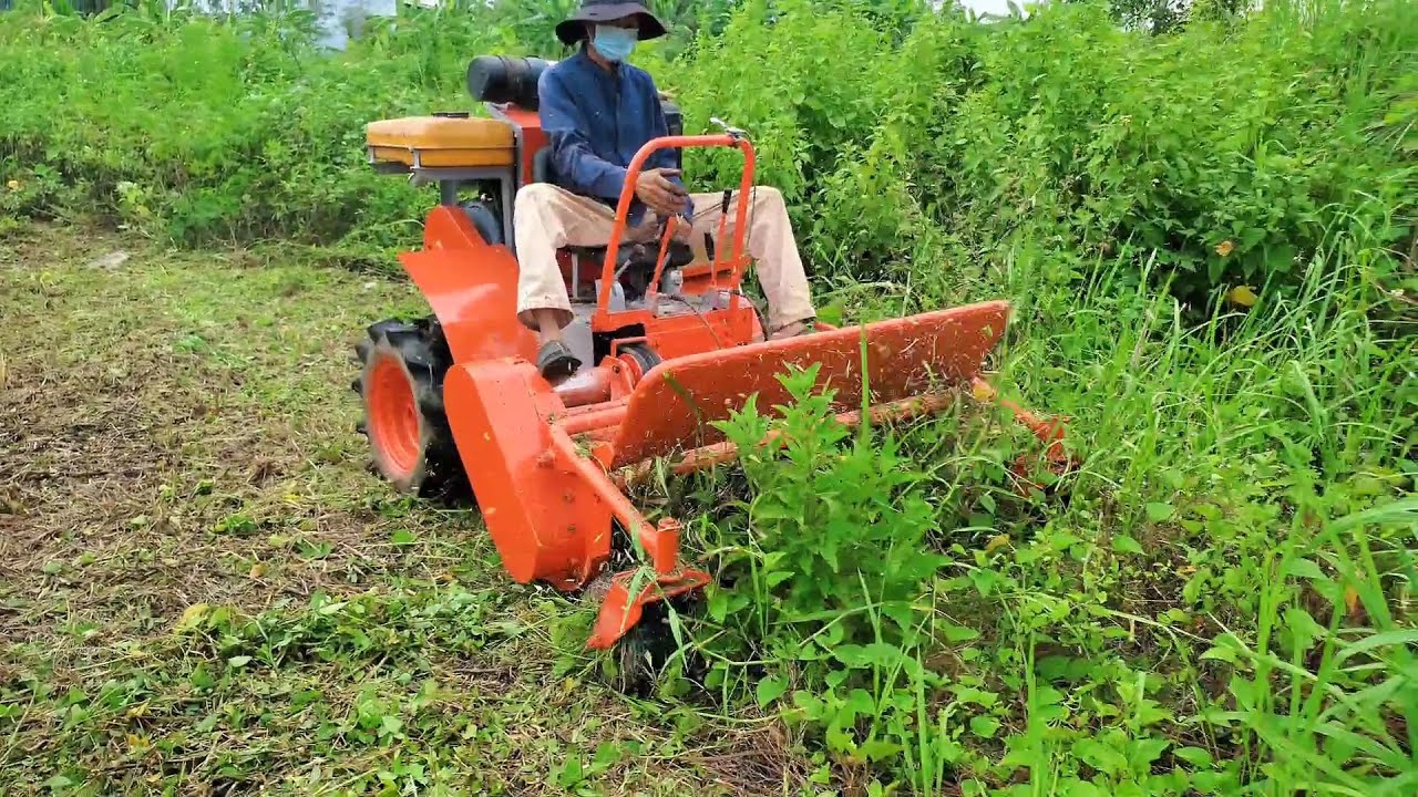 MÁY CẮT CỎ TRỤC BĂM-NGỒI LÁI