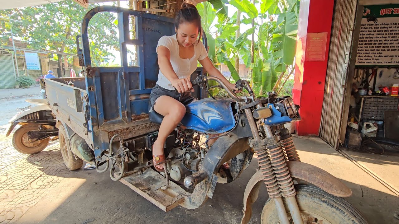The Genius Girl repairing a tractor for her people