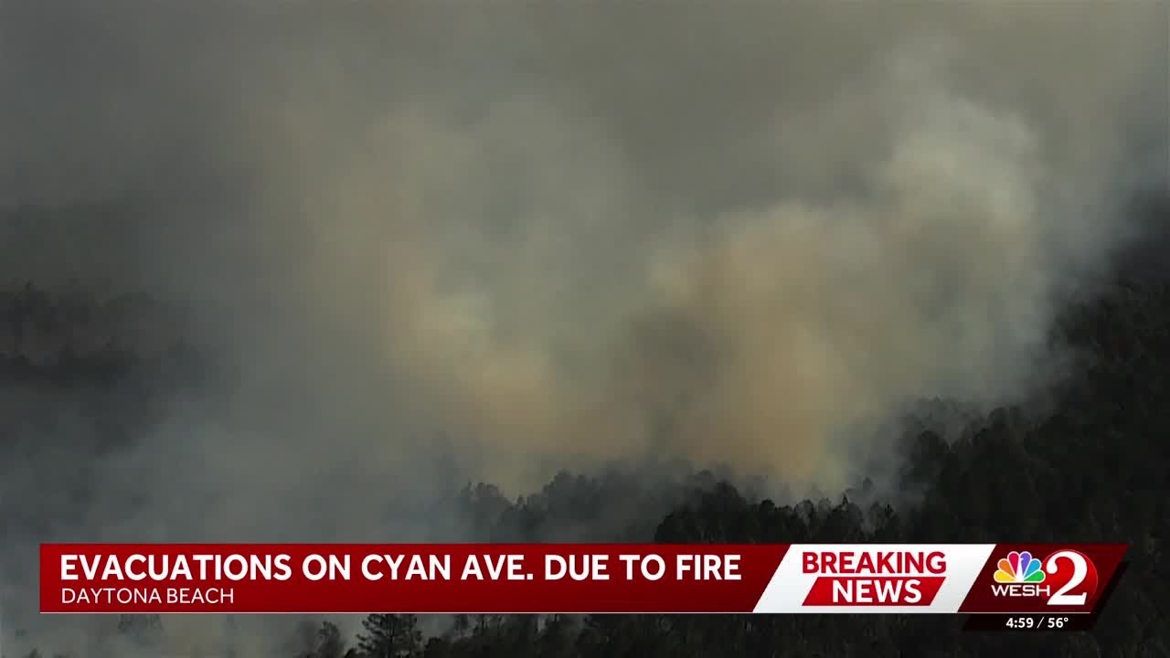 Evacuations underway after brush fire burns near school in Daytona Beach