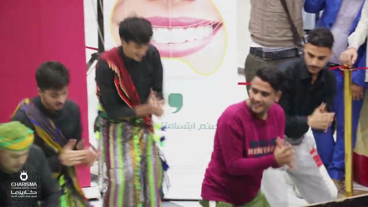 فلاش موب ارحبوا مونديال قطر - عيادات كاريزما نصنع  ابتسامتك الجذابة