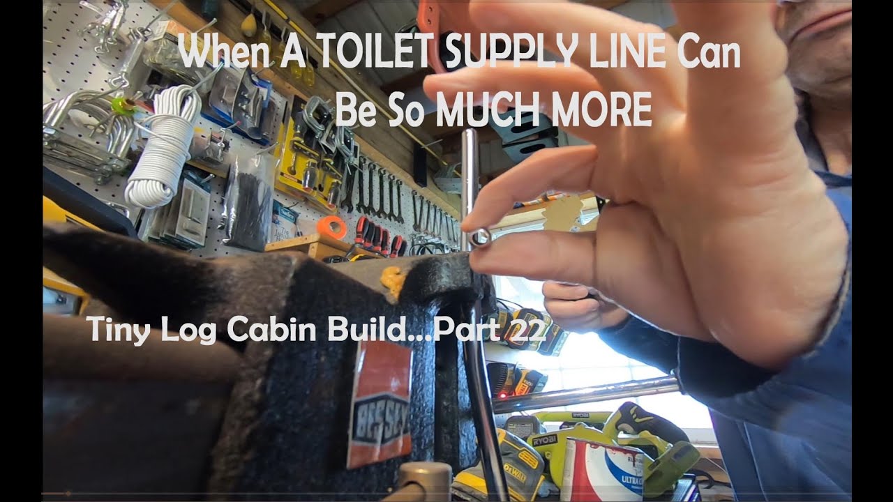 Wood Stove Heat Shield Using Metal Roofing and a TOILET SUPPLY LINE...Tiny Log Cabin Build Part 22
