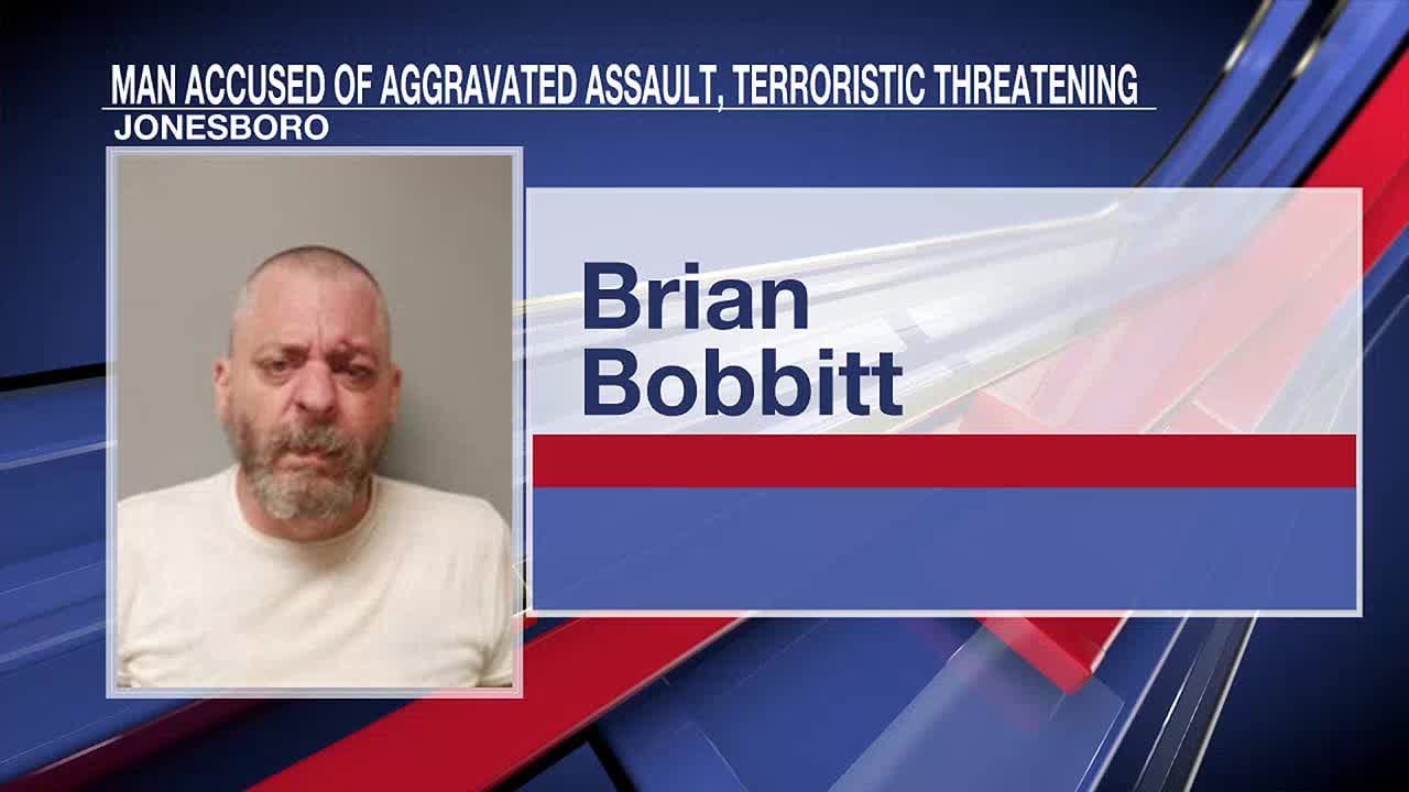 Man arrested after firing gun with multiple victims inside home