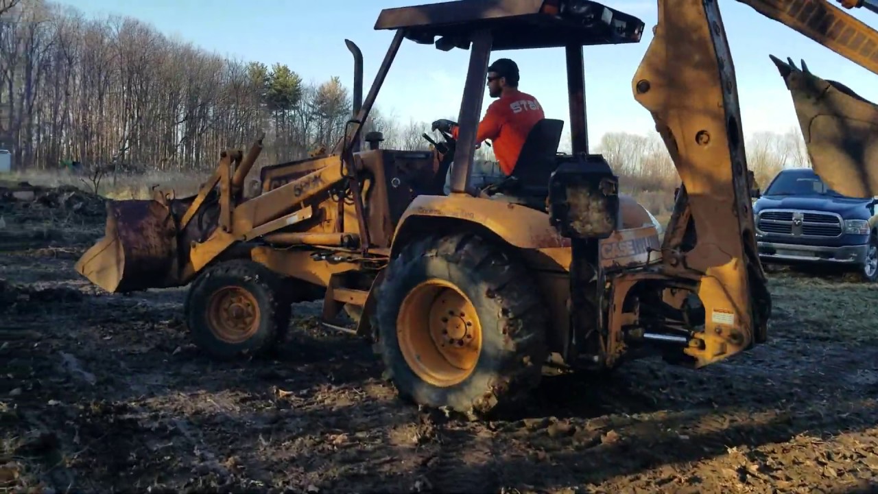Case 580K - Cleaning up some muck!!