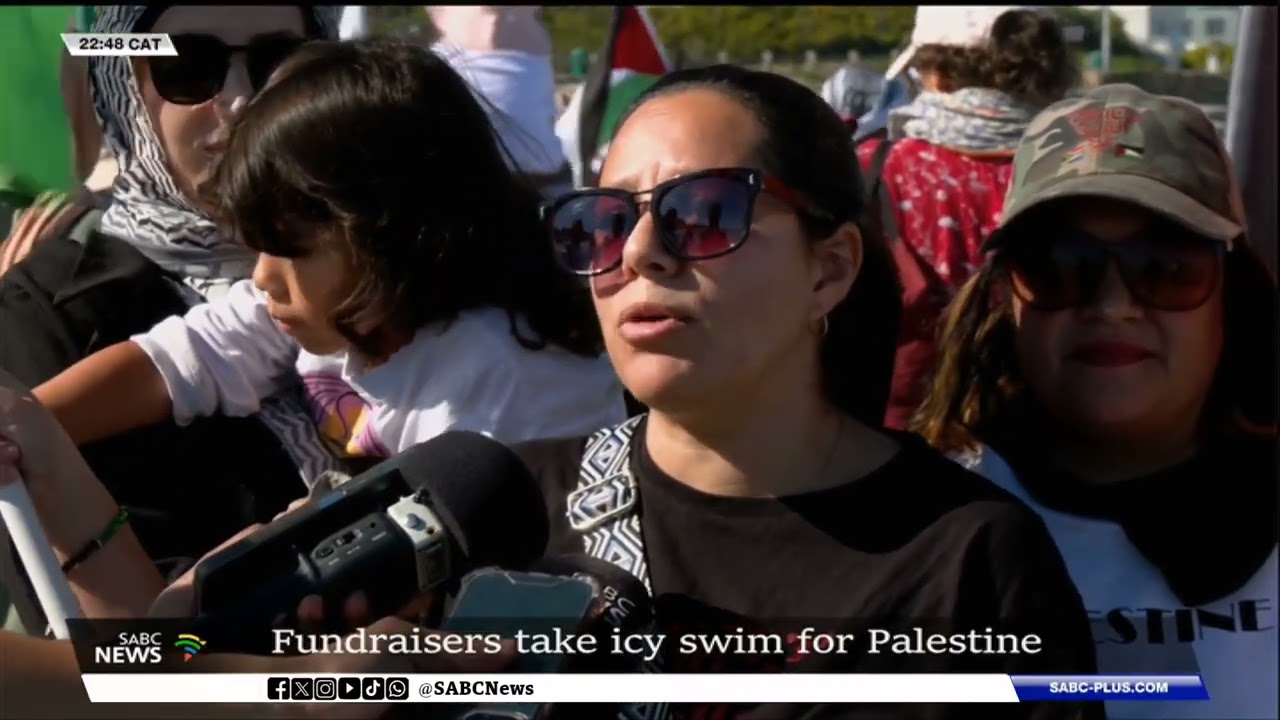 Fundraisers take icy swim for Palestine