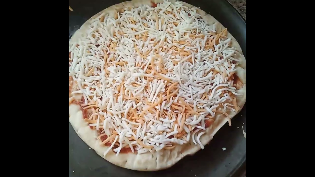 MAKING PIZZA [ Original PIZZA CURST, PIZZA SAUCE, MILD CHEEDAR, MOZZARELLA CHEESE , PEPPERONI 