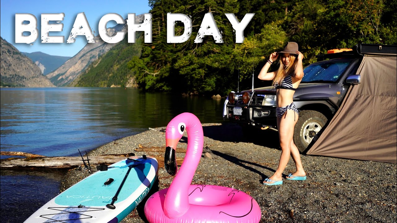Paddle boarding on a lake SOLO - 4WD Camping in a Land Cruiser