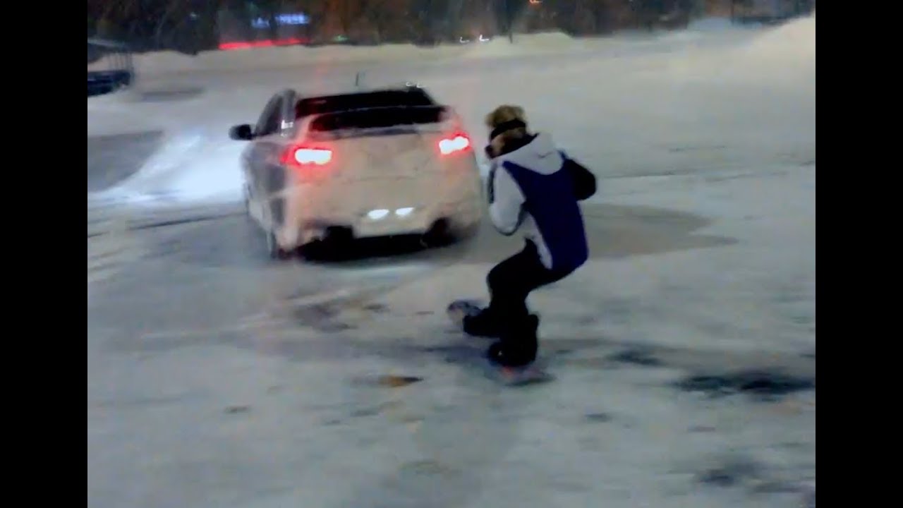 Subaru WRX STi and EVO 10 playing in the snow