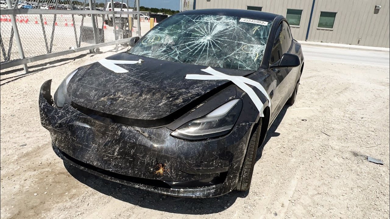 TESLA TOTALED IN PILE-UP CRASH