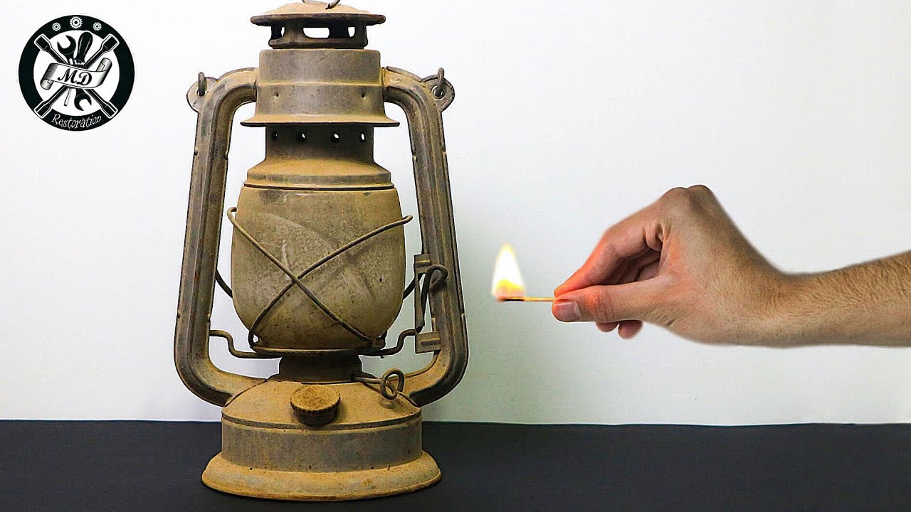 Restoration of the old rusty oil lamp