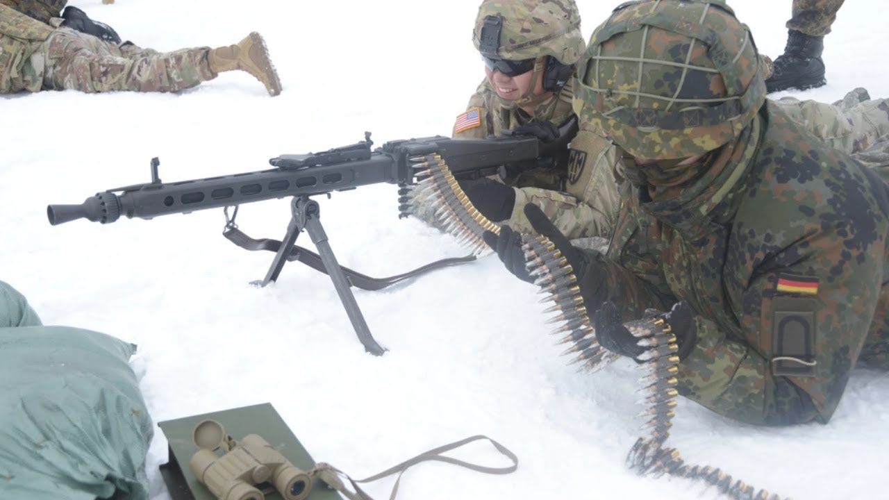 American Soldiers trying to fire German Army MG-3 Machine Gun