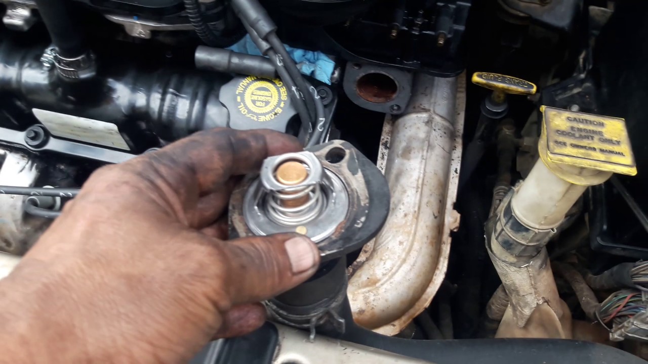 Cambiar termostato de 2002 dodge caravan