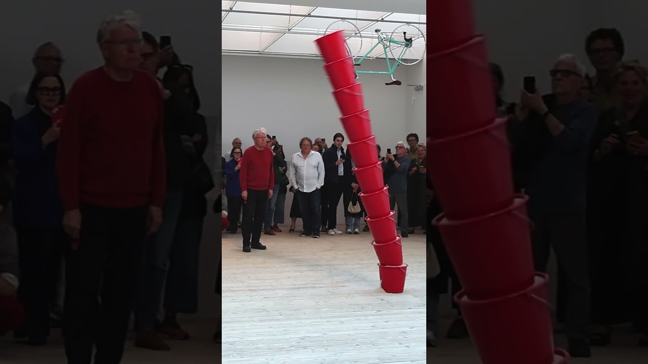 Artist Roman Signer activates his sand bucket sculpture at Malm&ouml; Konsthall