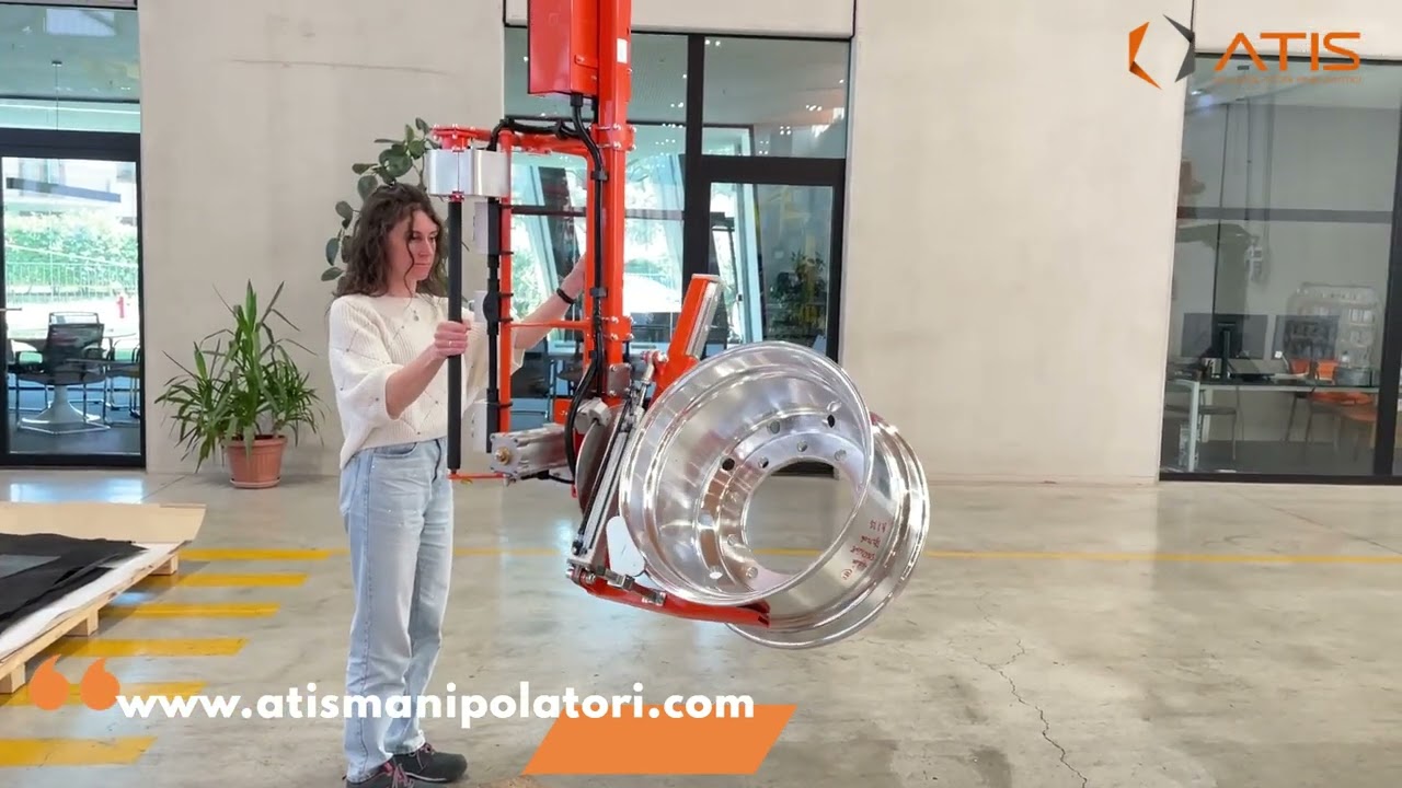 Manipolatore pneumatico per cerchioni_Pneumatic Manipulator for Rims Handling
