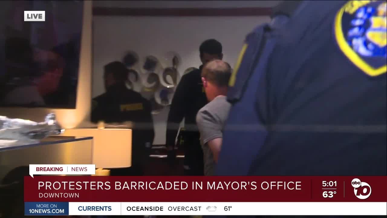 Group barricades inside Mayor Gloria's office, demands meeting over ICE