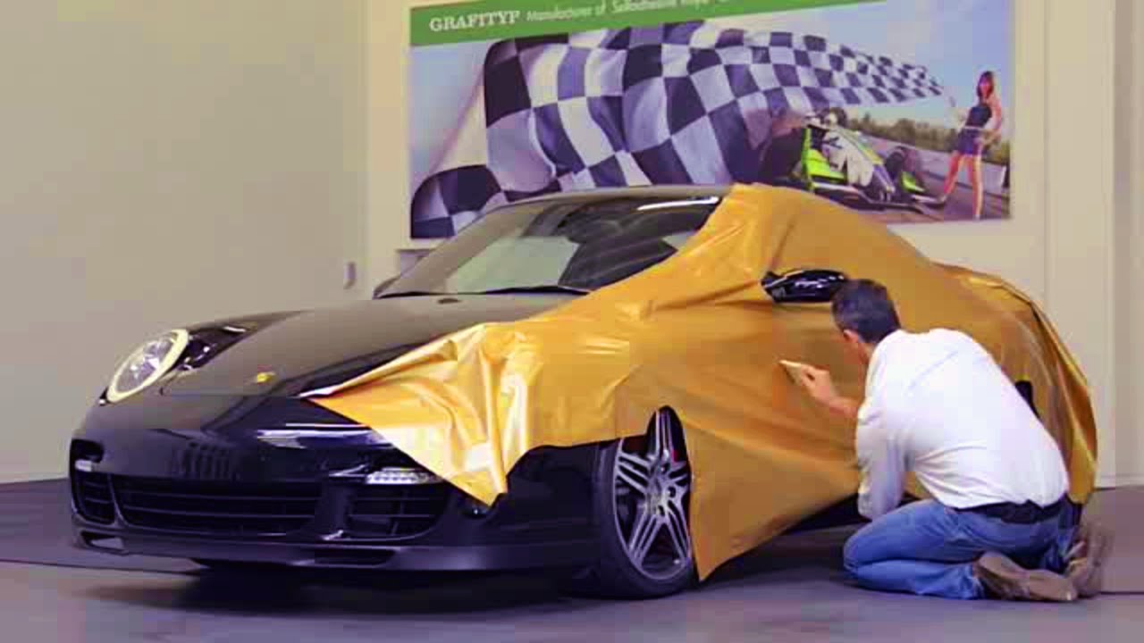 Оклейка Porsche винилом. Золотая пленка.