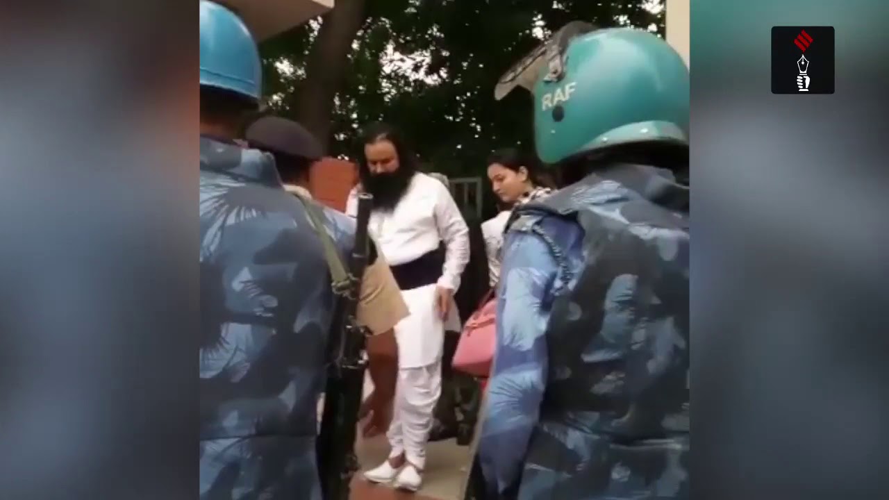 Convicted Of Rape, Baba Gurmeet Ram Rahim Being Escorted Out Of Panchkula Court