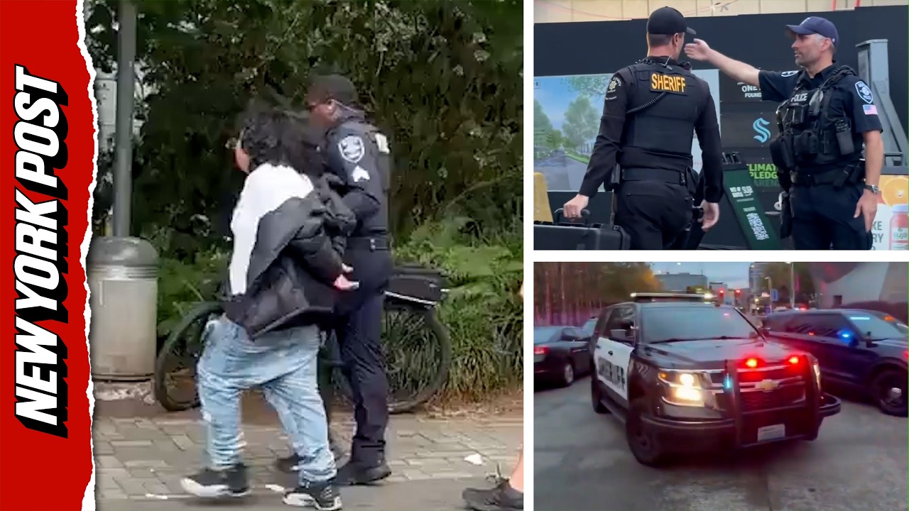 Handcuffed Person Led Away After Deadly Seattle Festival Shooting