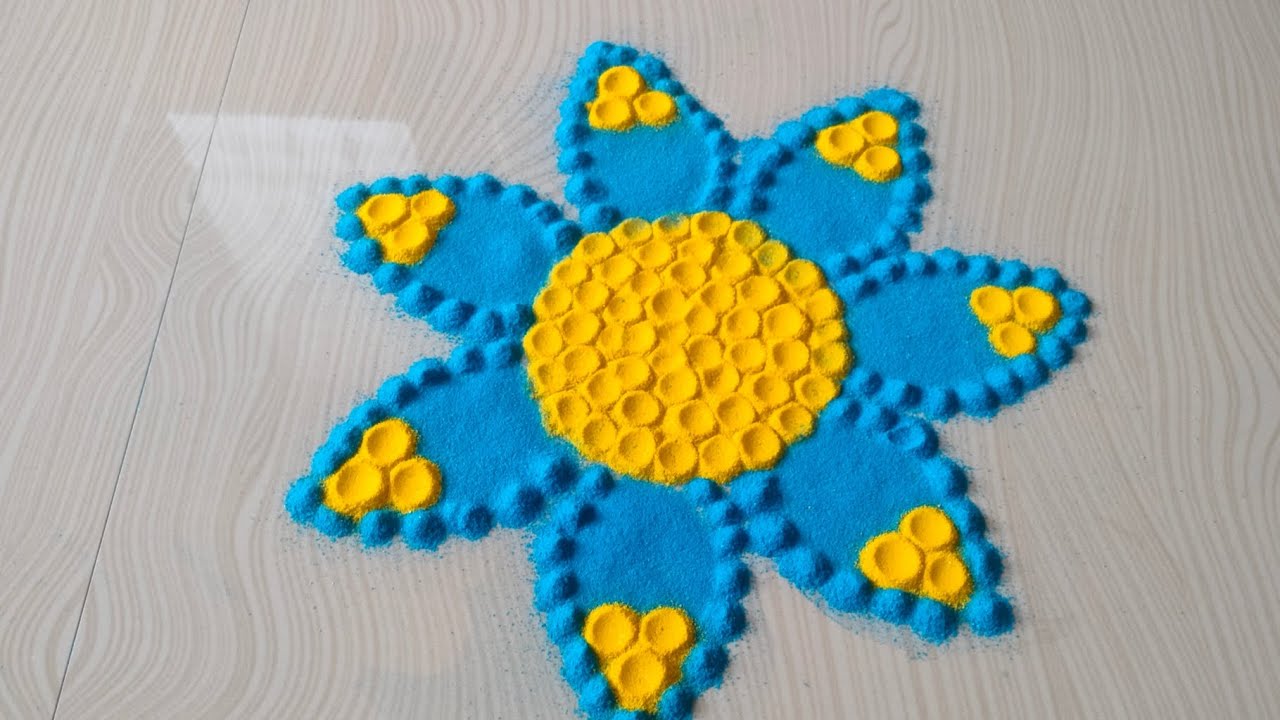Simple and easy rangoli 🤩. #youtubevideo #easyrangoli #rangolidesigns 