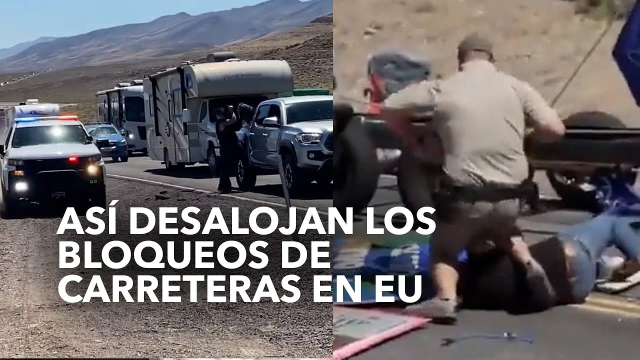 Activistas bloquean carretera y policía les echa encima la patrulla