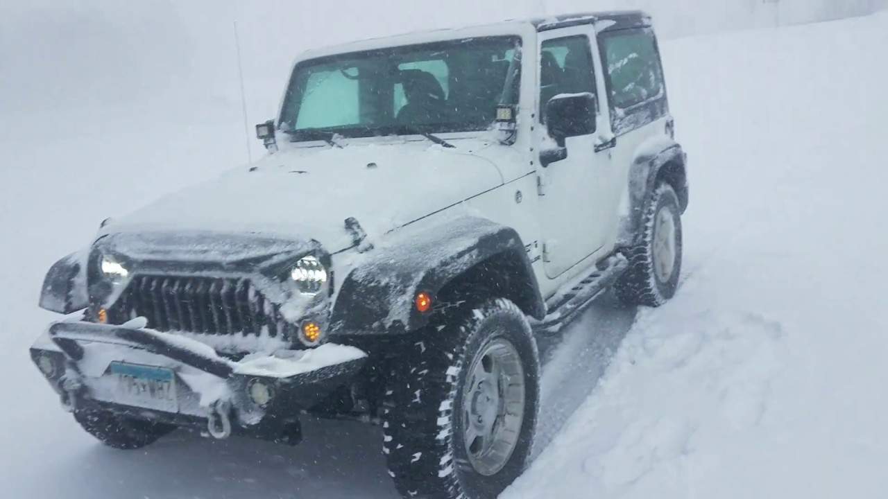 Jeep Wrangler in Minnesota blizzard