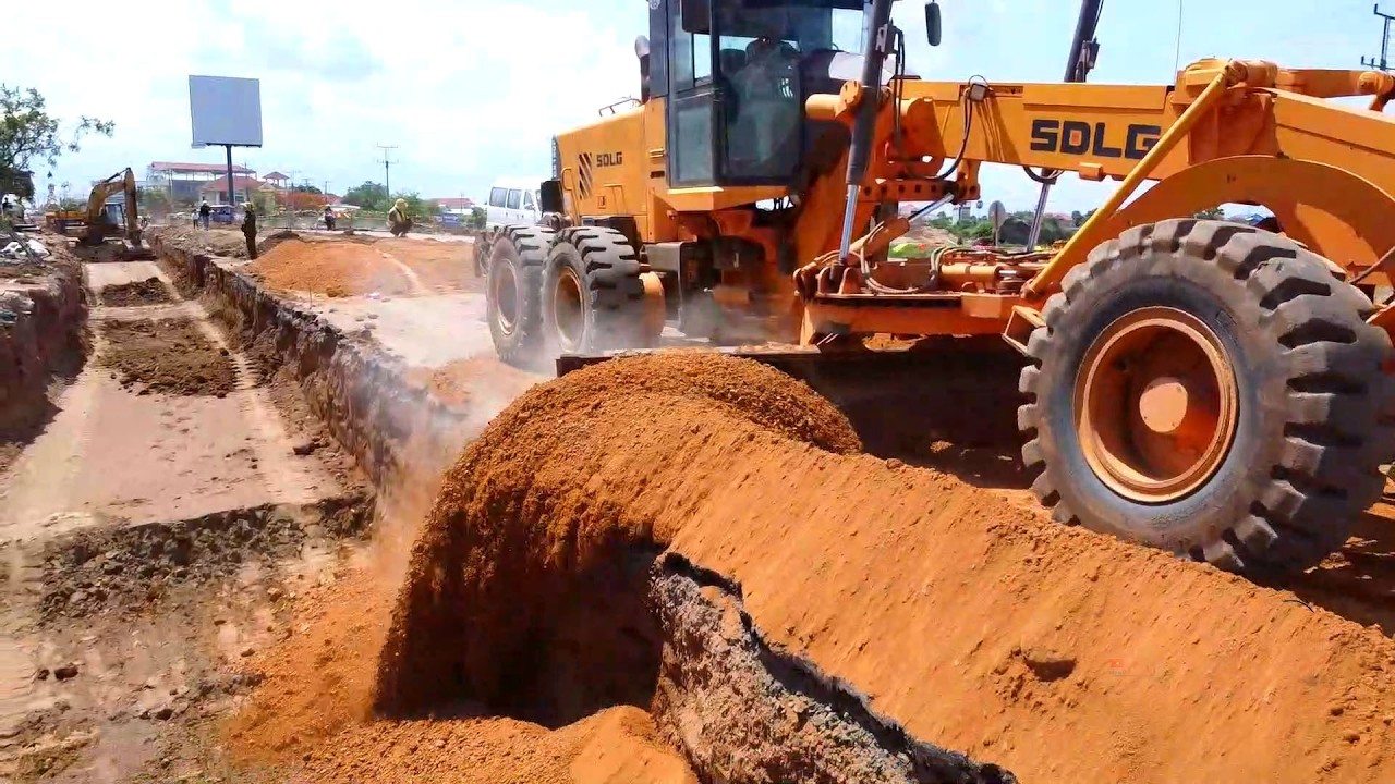 The Grader Making roads according to standards with modern machines.