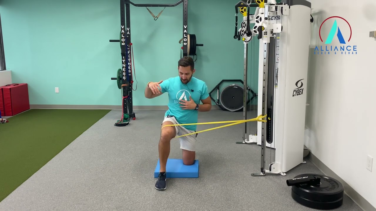 Half Kneeling Banded Hip External Rotation