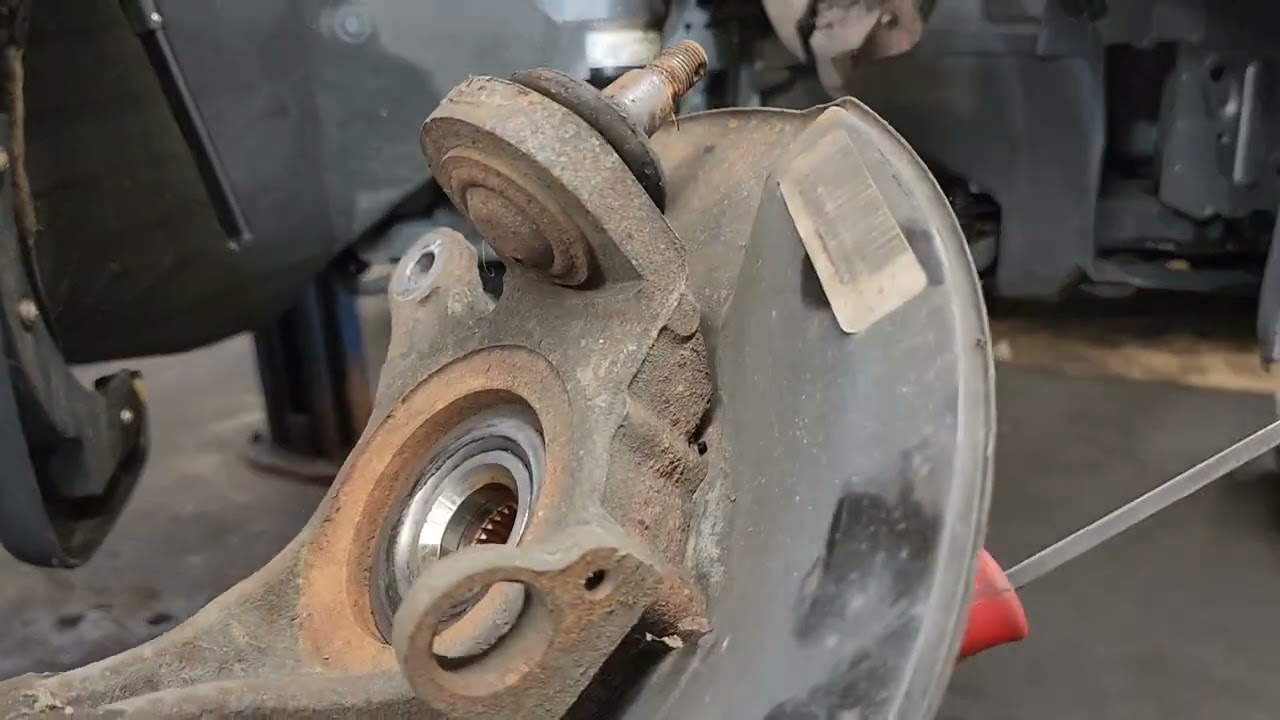 Замена переднего ступичного подшипника Honda Civic Coupe 2005 года