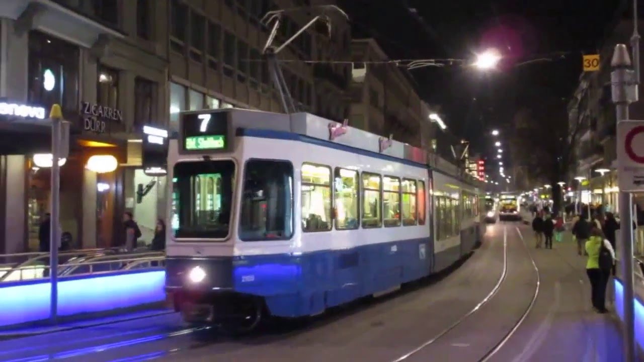 Switzerland: Zurich trams by night outside the Hauptbahnhof