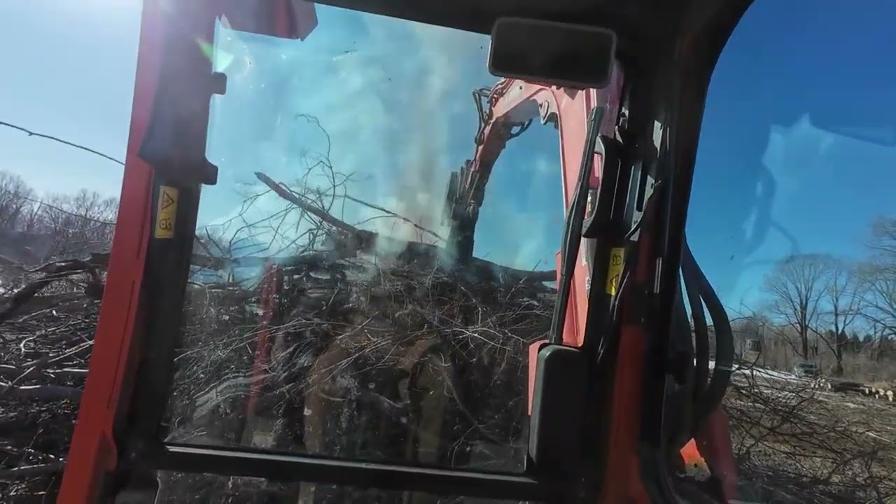 Burning the brush piles on fence line 