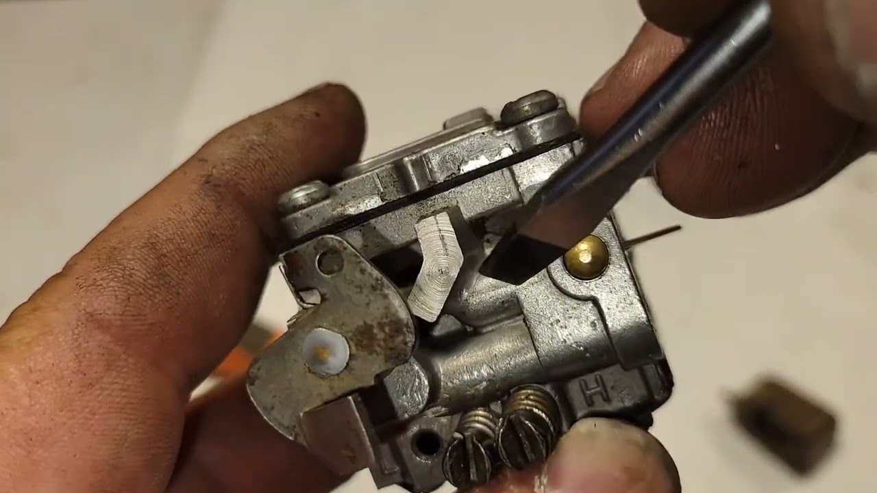 Reparing a trigger that sticks wide open on a husqvarna 266xp