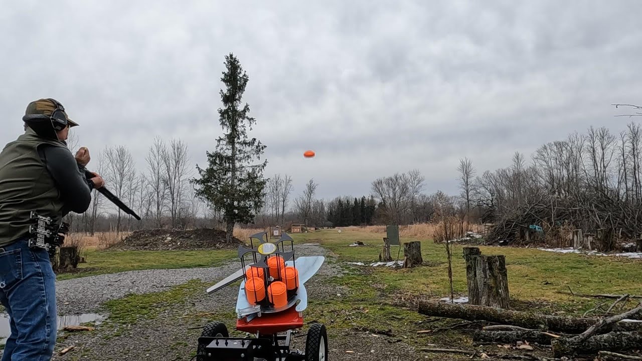 My first clay target machine the MEC 100E wobble.  25 round flush loading from the belt 3 gun style