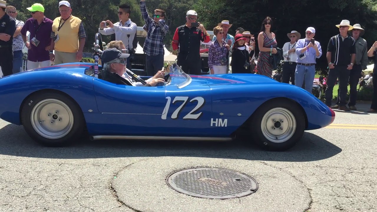 Historic cars leave Quail Lodge Golf Club Carmel Valley for Monterey car week PebbleBeach Concours
