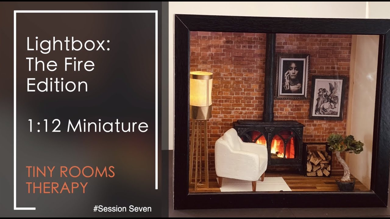 While you were charging...   Miniature Wood Burner in a Lightbox