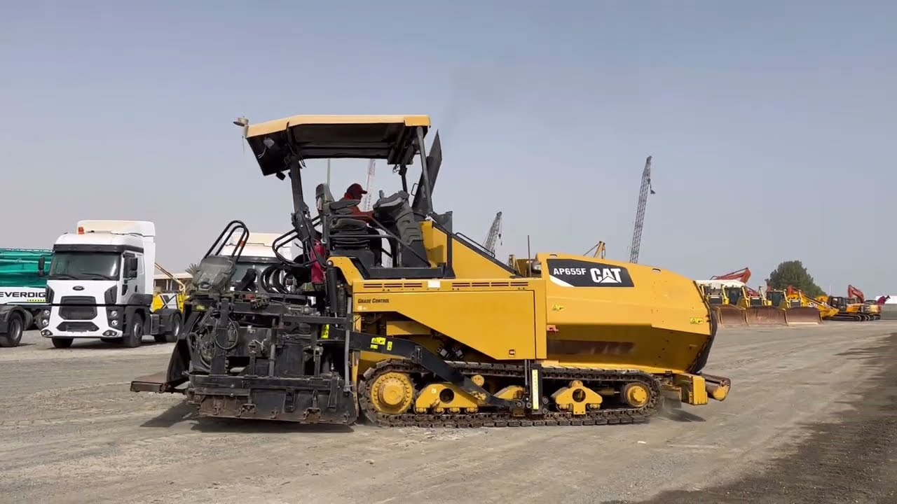 2019 Caterpillar AP655F LRC Crawler Asphalt Paver checking the functionality test. heavy equipment