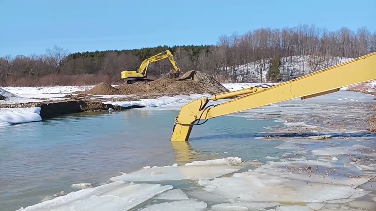 Excavators at work, Long reach dredging