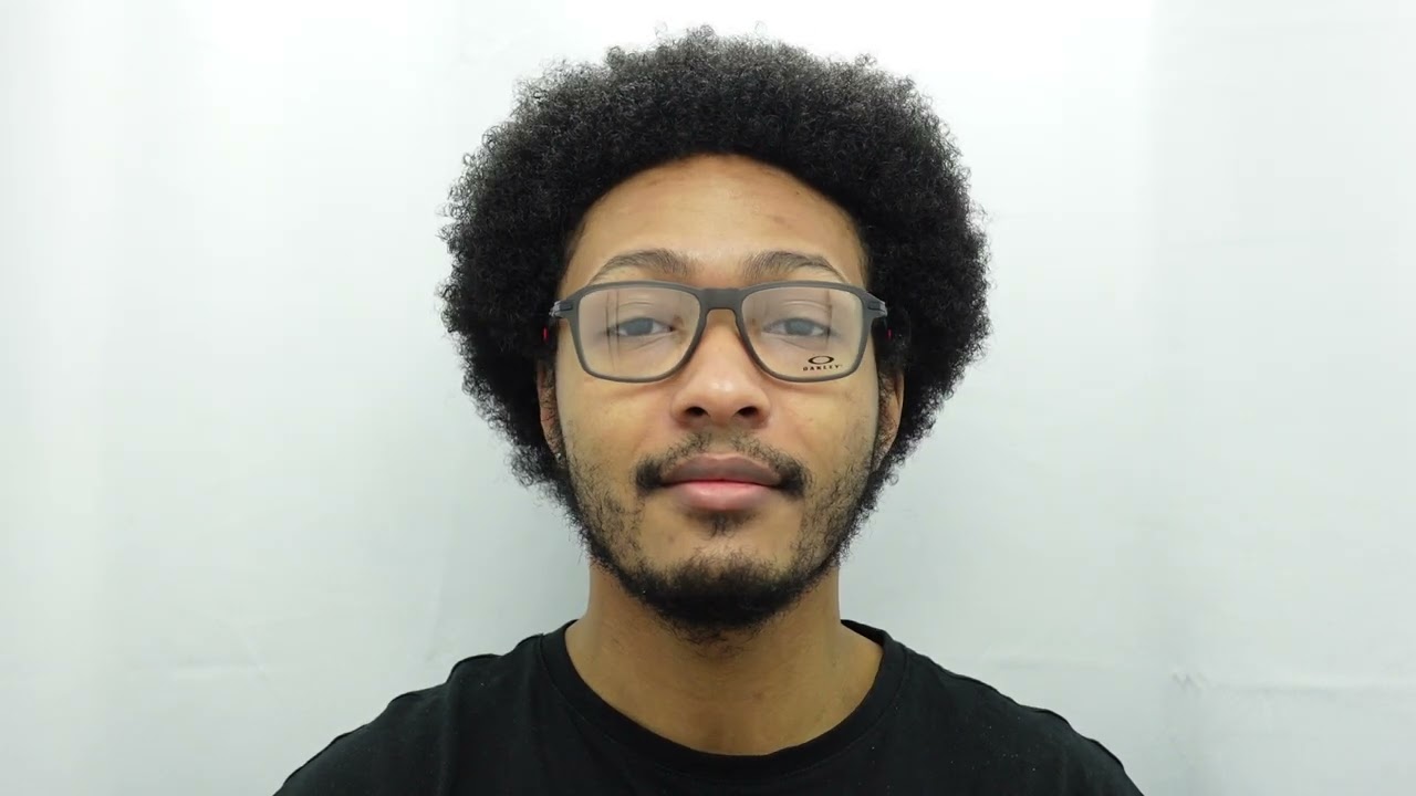 Male model wearing Oakley RX Wheelhouse 8166-03 54mm Glasses