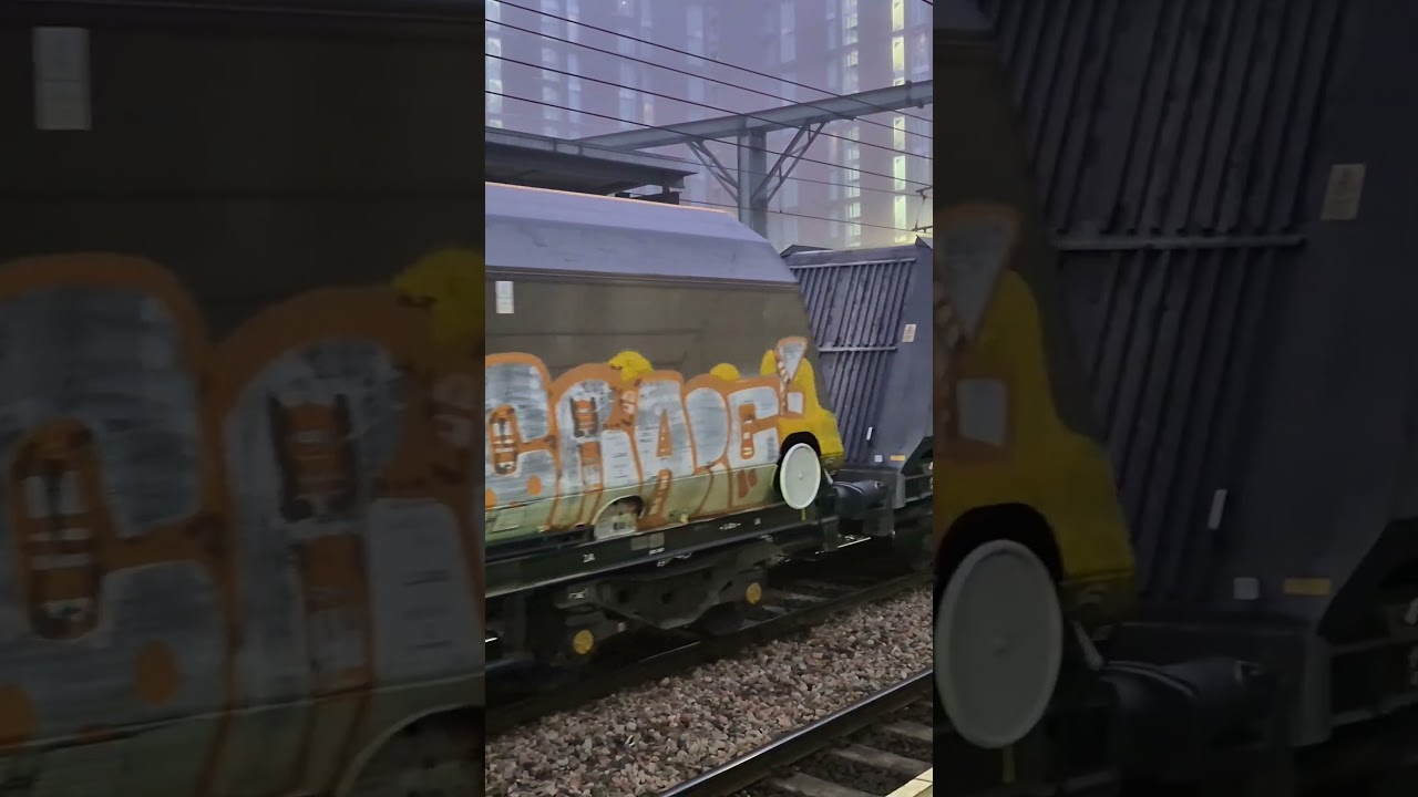 Goods train passes by at Leeds Train Station