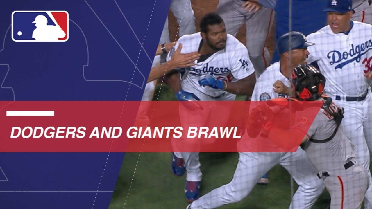 Benches clear after Yasiel Puig, Nick Hundley get into confrontation