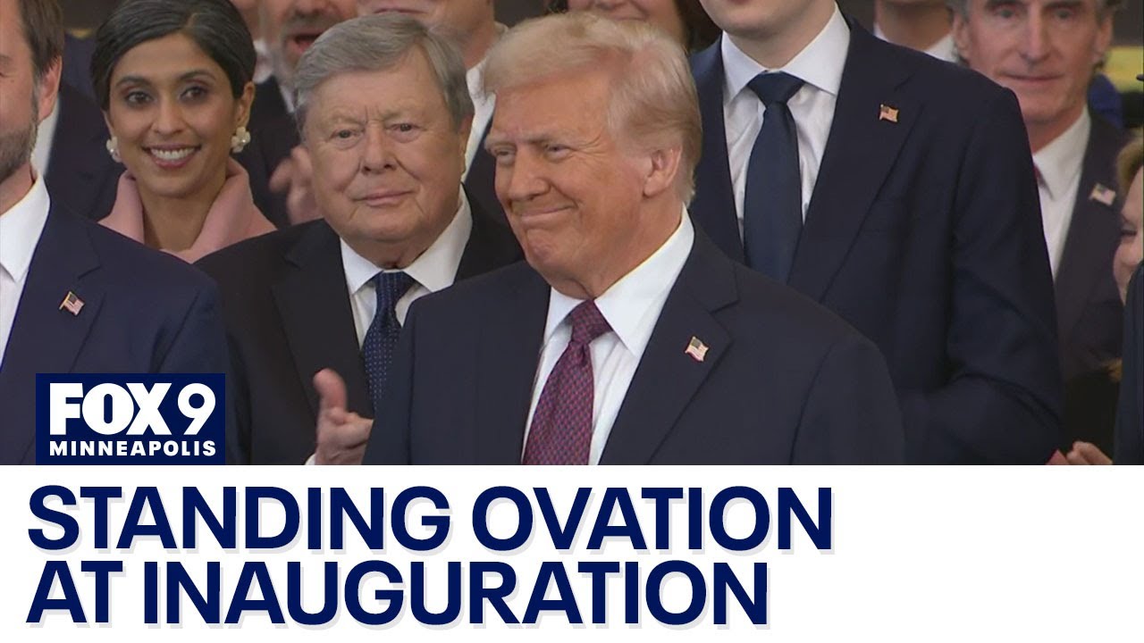 Donald Trump receives standing ovation after inauguration entrance