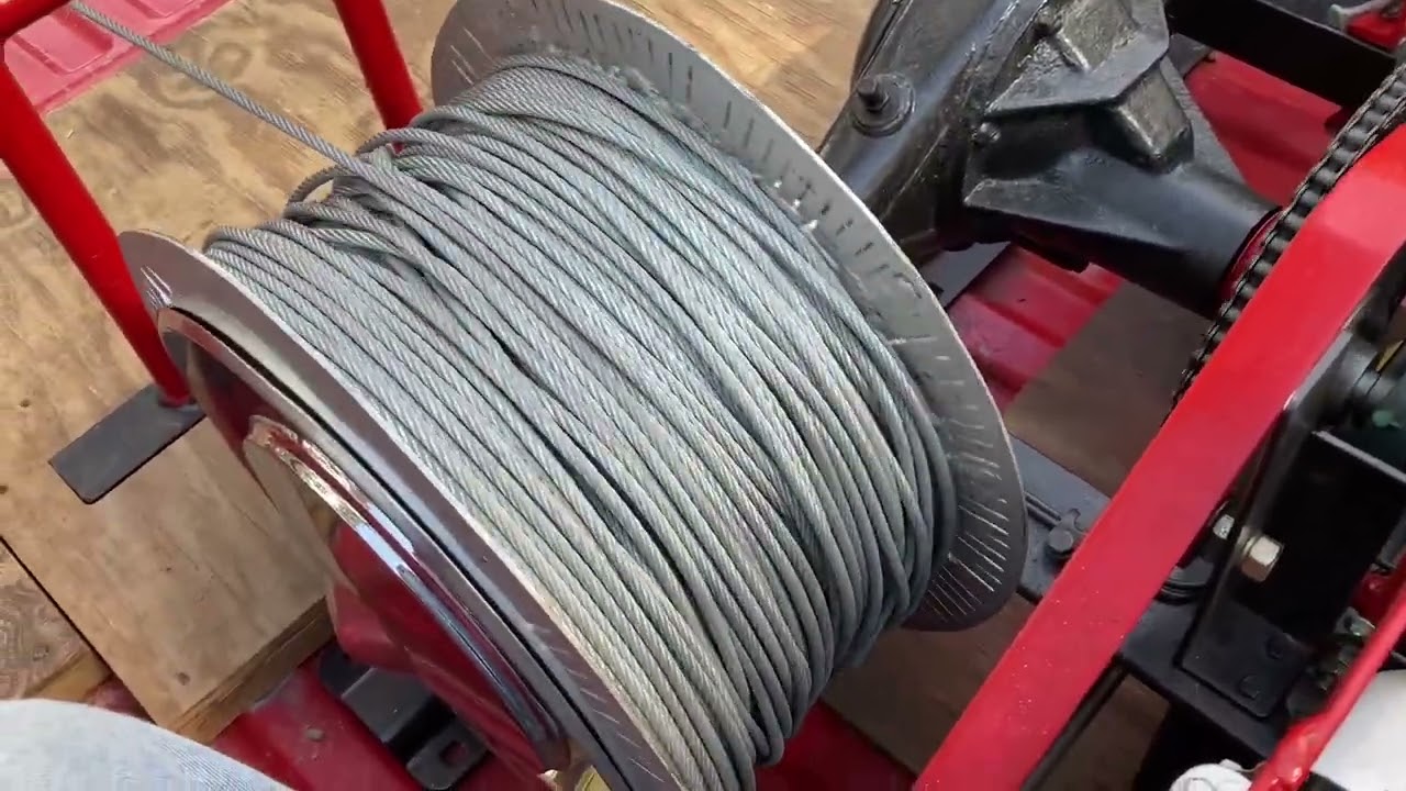 Closeup of running homemade gas powered winch