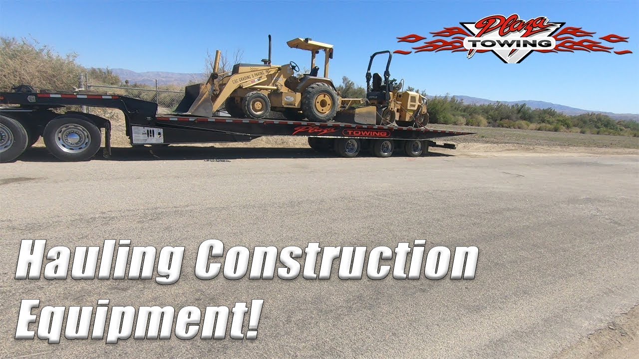 Hauling a Skip Loader and Roller