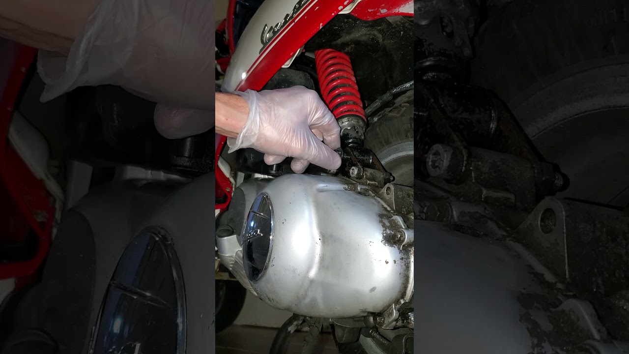How to change a vespa s150 back shock absorber.