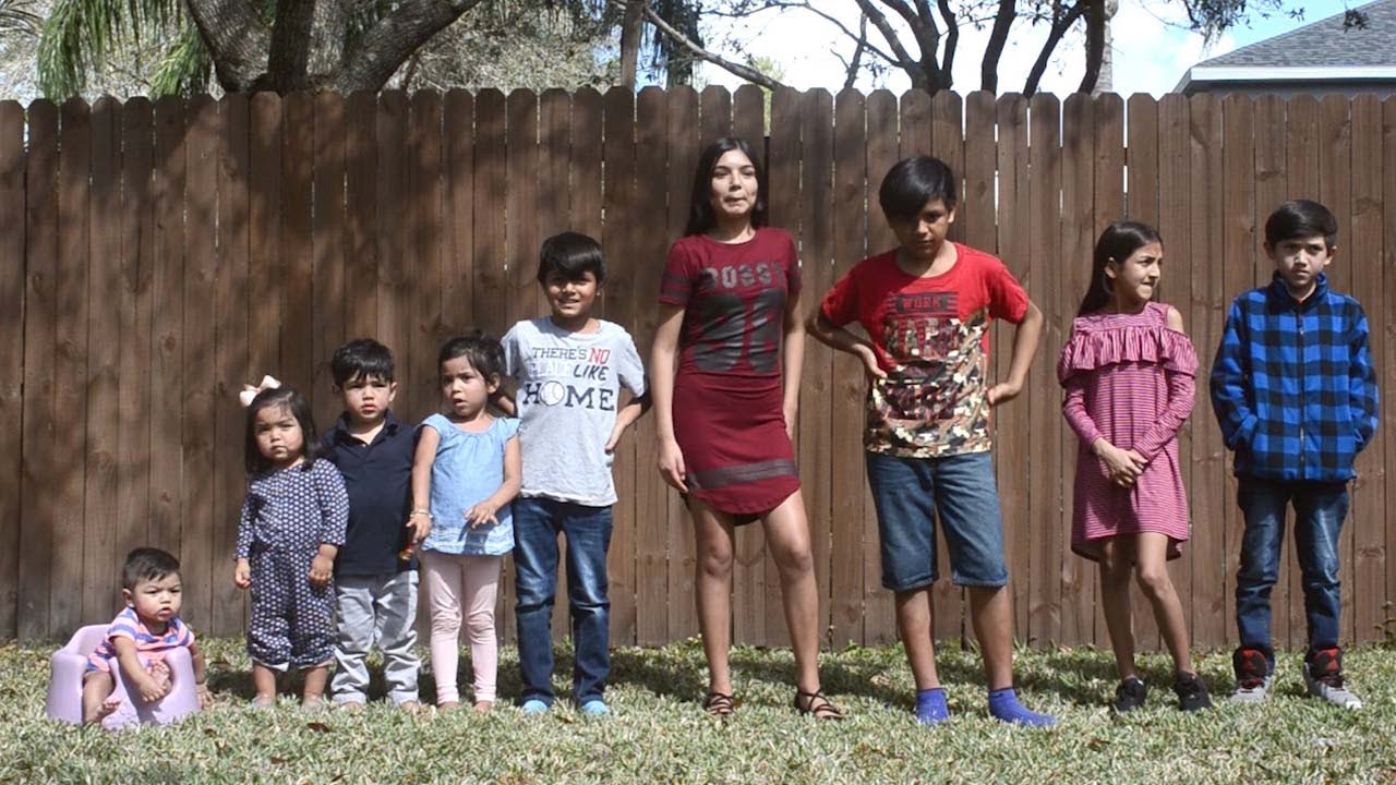Family Adopt Nine Children To Keep Them Together