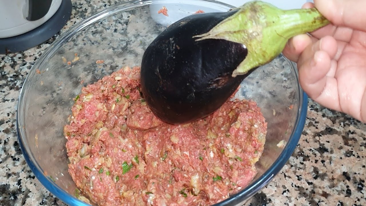 أضيفي الدنجال على الكفتة النتيجة ستعجبك الذ طاجين بالبادنجال يستحق التجربة 👌👌