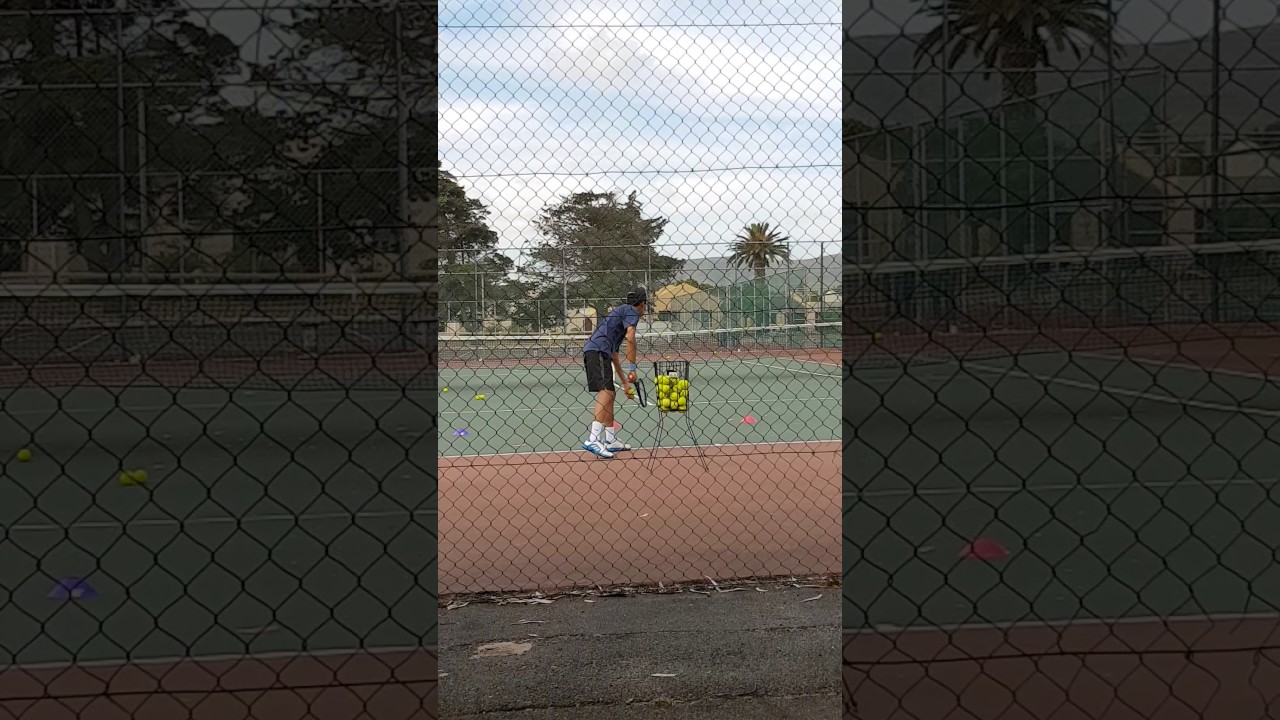 Christopher tennis practice- serves
