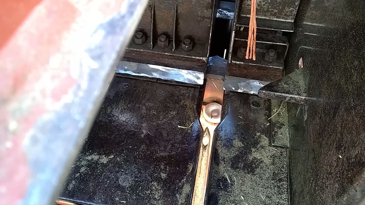 Inline baler plunger removal setting blades