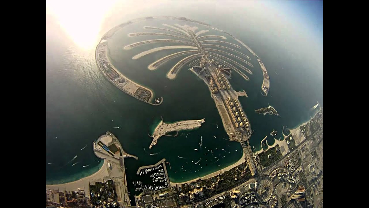 Skydive Dubai. Wingsuit flying above skyscrapers and Palm Jumeirah.